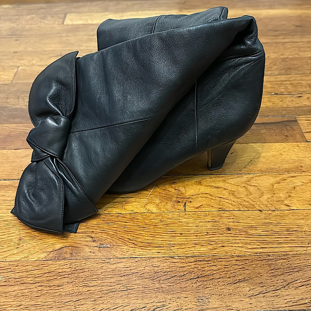 Black Valentino Garavani high boot.